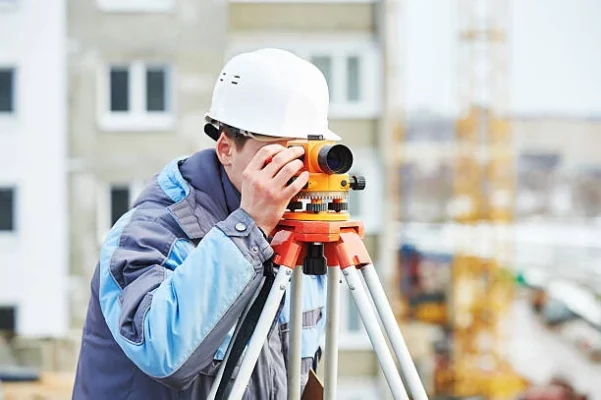 resolution property surveyor checking with camera